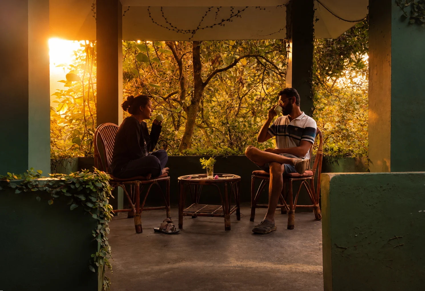 couple enjoying tea  at sunrise